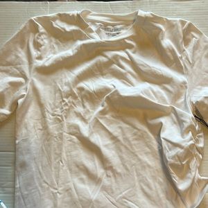 Grlfrnd white tee one side is crimped for style made of n Portugal